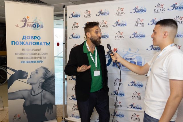 Tamir Hitman giving an interview at the Mediterranean Sea international festival